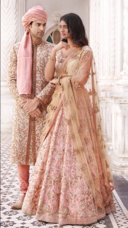 Heavy embroidered light pink wedding bridal lehenga