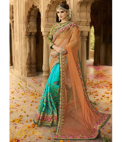 heavy embroidered orange and rama half wedding saree