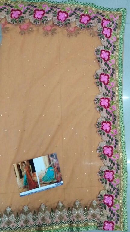 heavy embroidered orange and rama half wedding saree