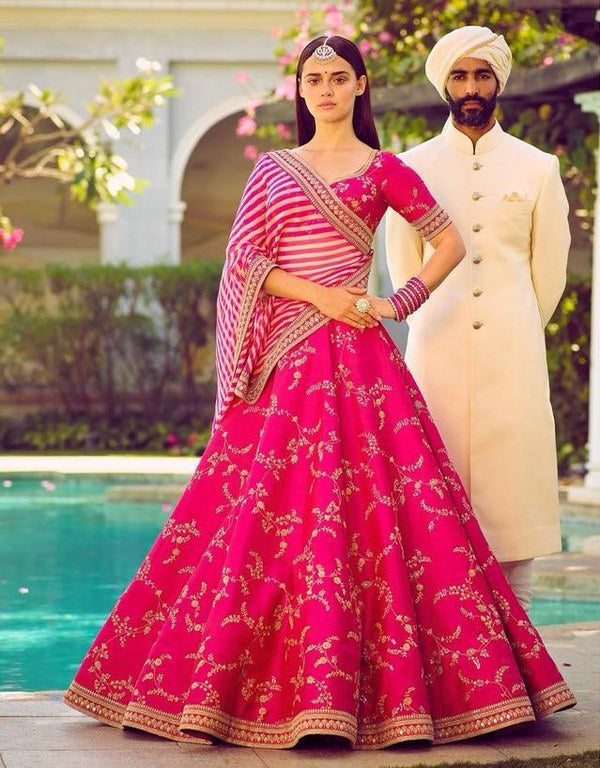 Heavy embroidered pink phantom silk bridal wedding lehenga