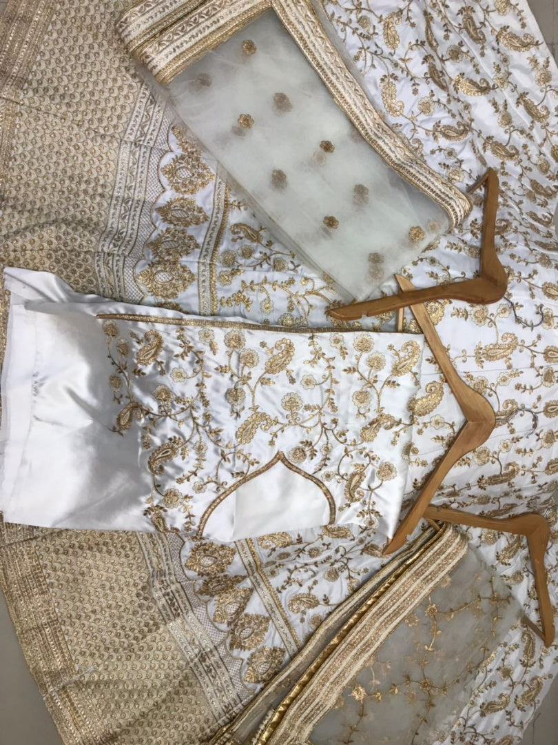 Heavy embroidered white bridal wedding lehenga