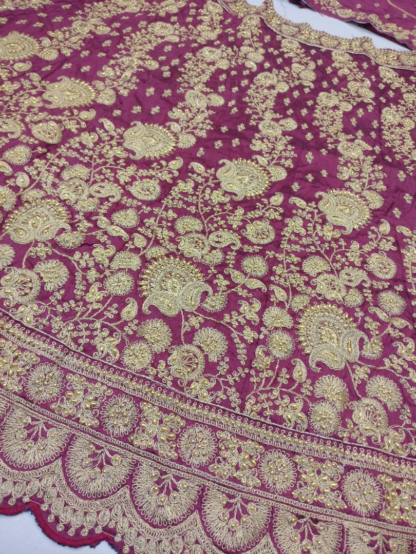 Heavy maroon phantom silk embroidered bridal lehenga