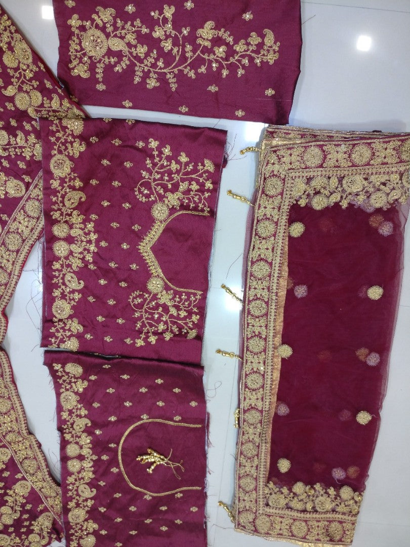Heavy maroon phantom silk embroidered bridal lehenga