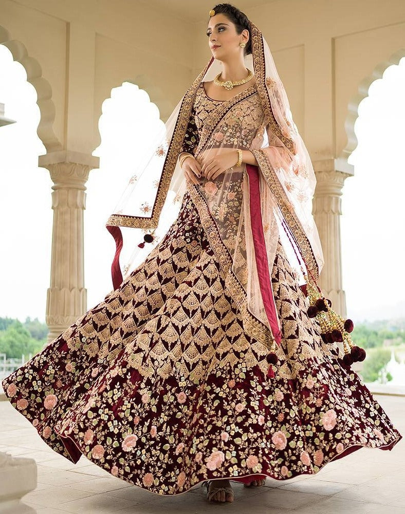 Heavy worked maroon velvet bridal lehenga