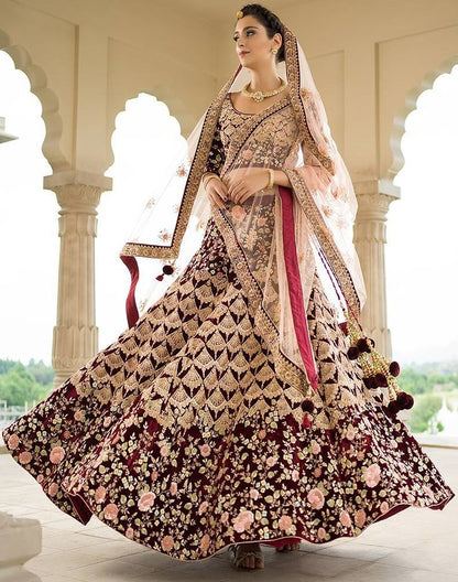 Heavy worked maroon velvet bridal lehenga
