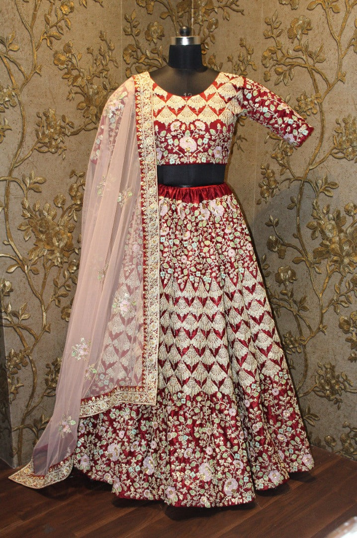 Heavy worked maroon velvet bridal lehenga