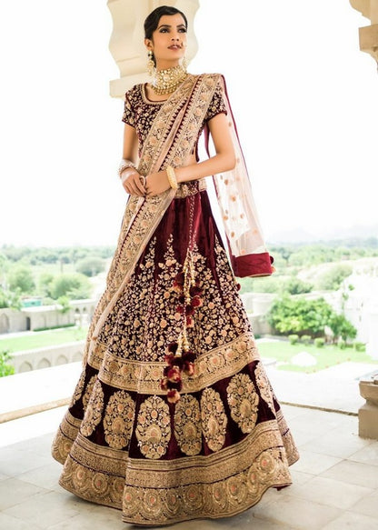Hevy embroidered maroon bridal lehenga
