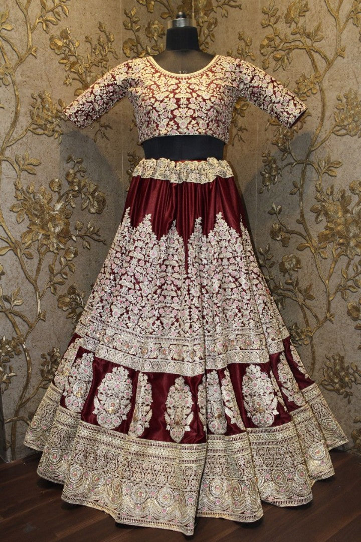 Hevy embroidered maroon bridal lehenga