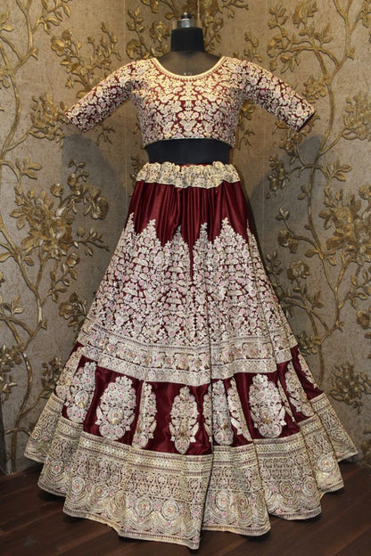 Hevy embroidered maroon bridal lehenga