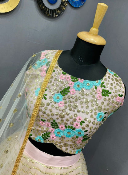 Light baby pink net heavy sequence work lehenga choli