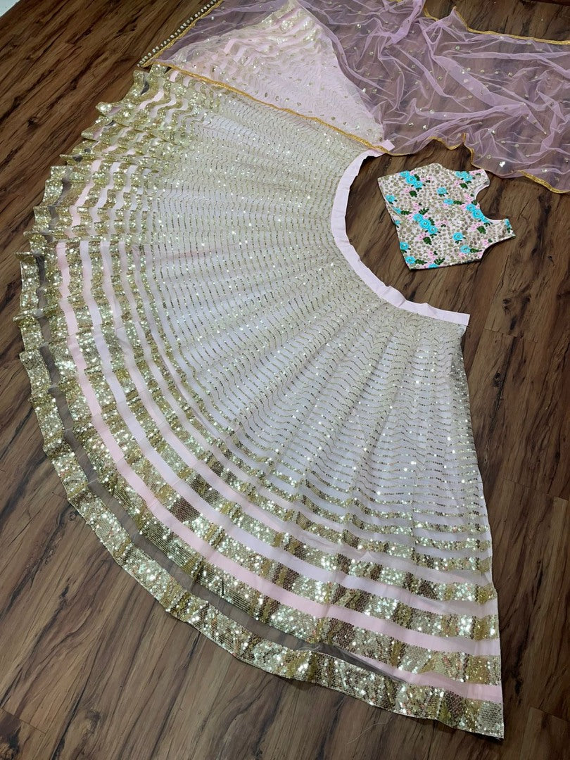 Light baby pink net heavy sequence work lehenga choli