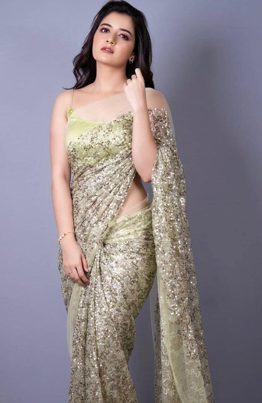 Light green heavy nylon net all over sequence work saree