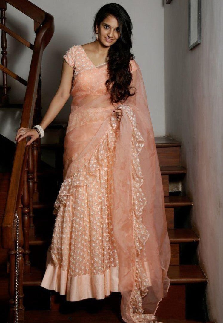 Light orange organza embroidery work saree