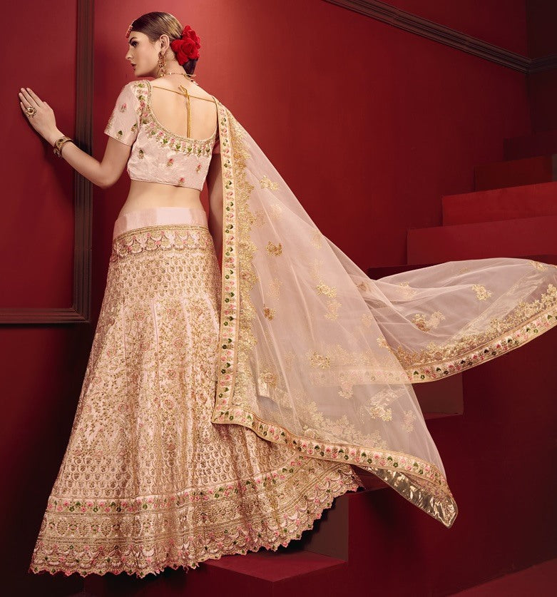 Light peach heavy designer embroidered bridal lehenga choli