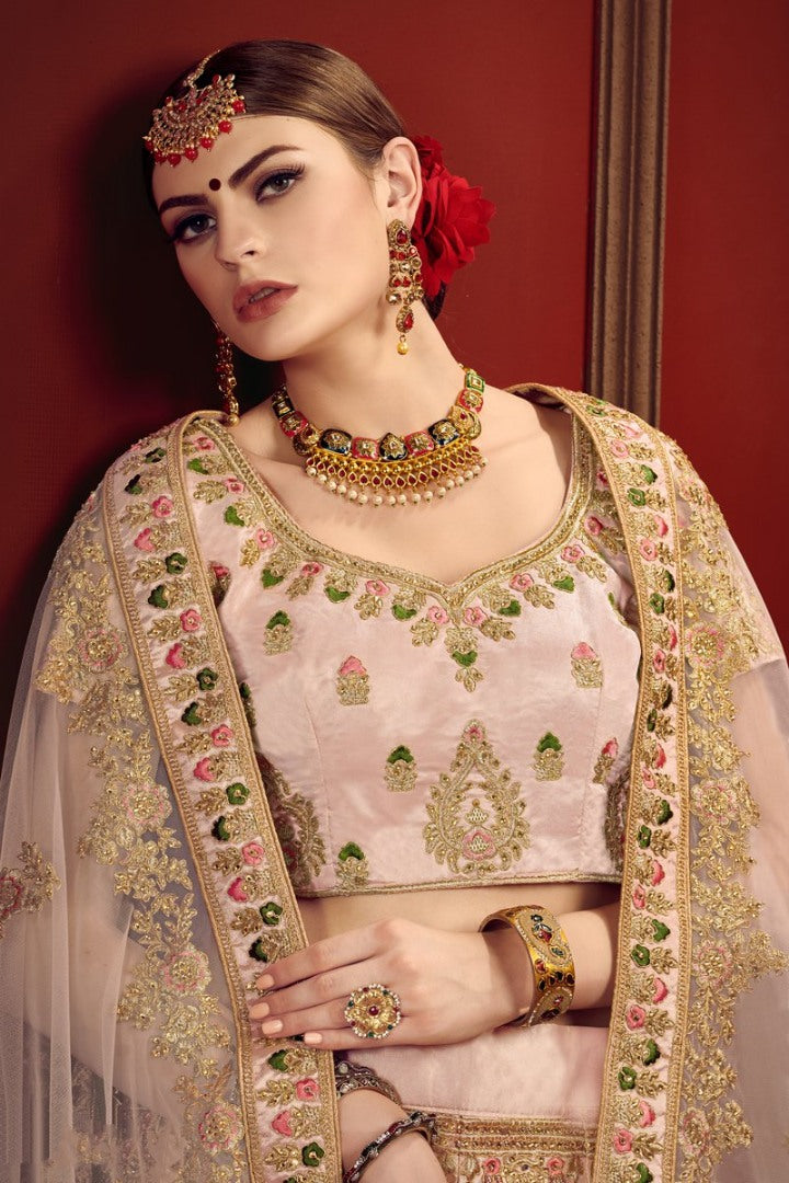 Light peach heavy designer embroidered bridal lehenga choli