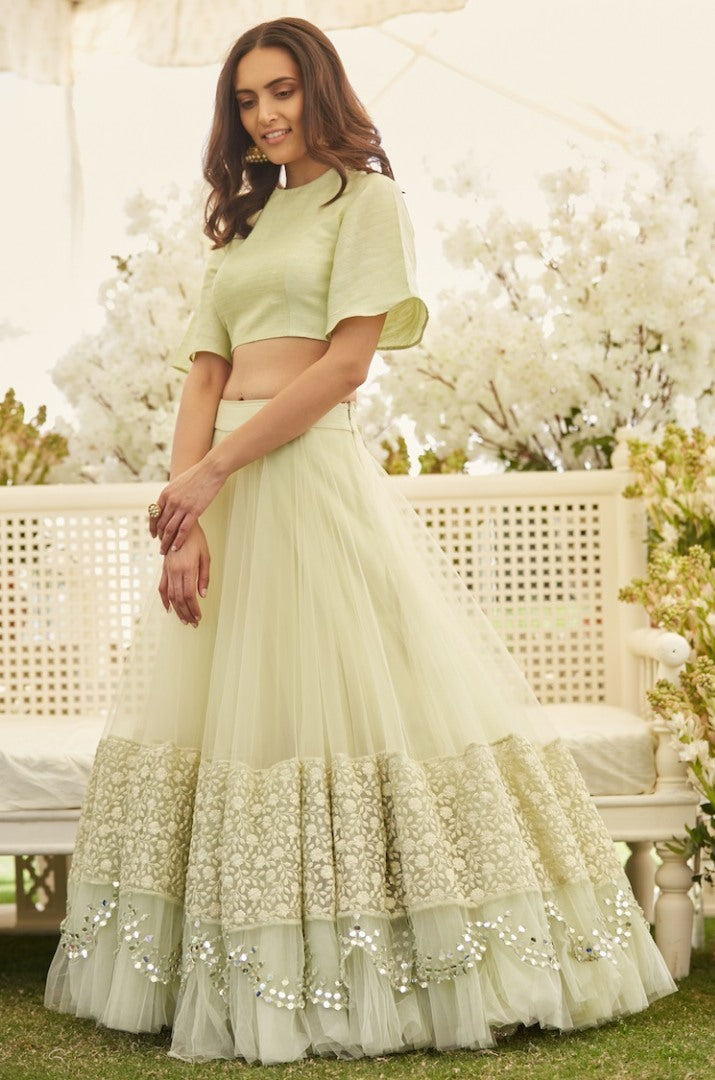 Light pista green soft net fabulous partywear lehenga
