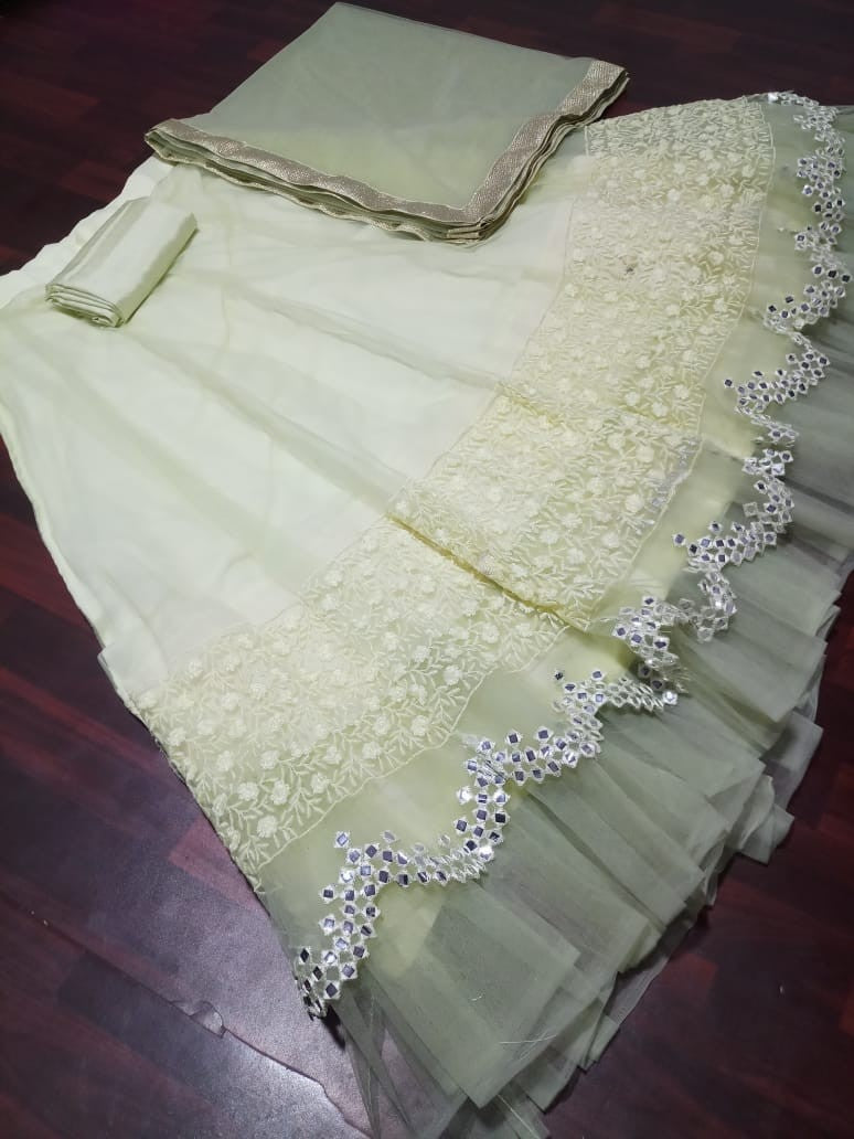 Light pista green soft net fabulous partywear lehenga