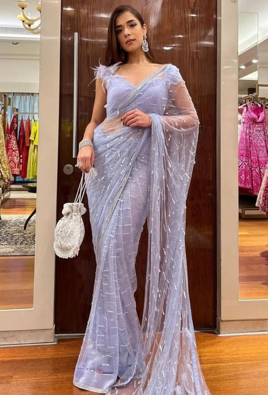 Light purple mono net thread sequence embroidered saree