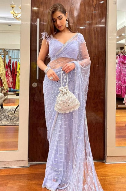 Light purple mono net thread sequence embroidered saree