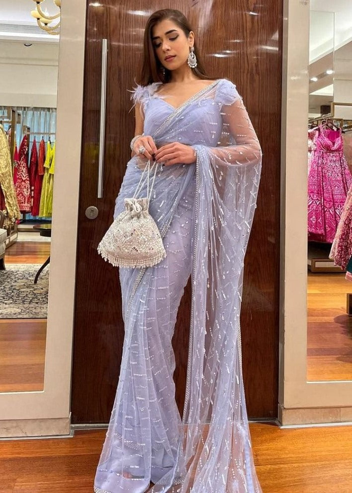 Light purple mono net thread sequence embroidered saree