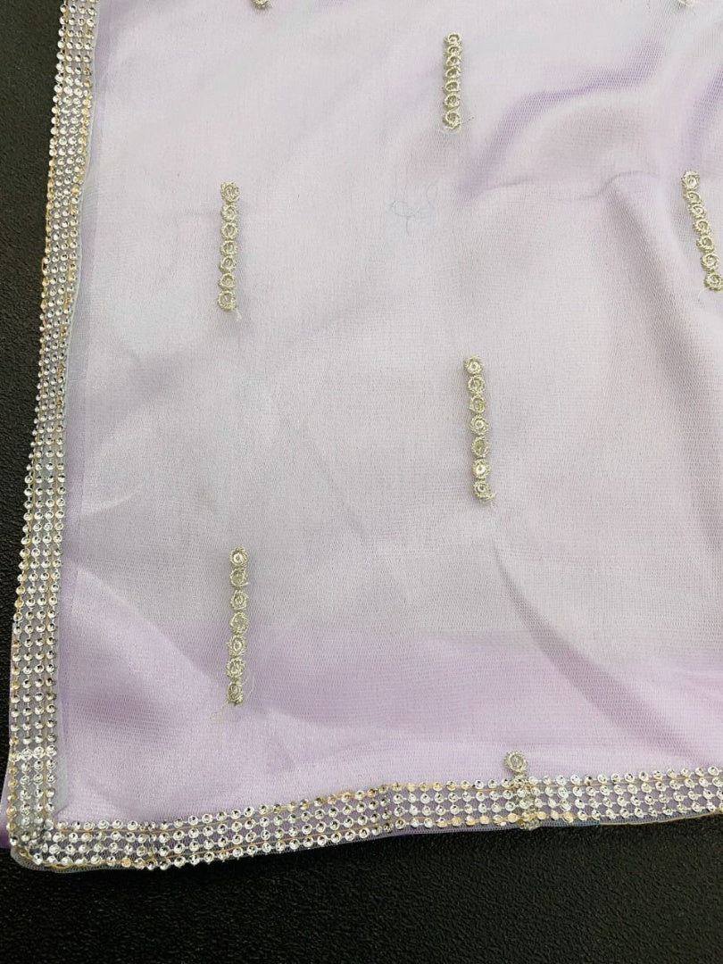 Light purple mono net thread sequence embroidered saree