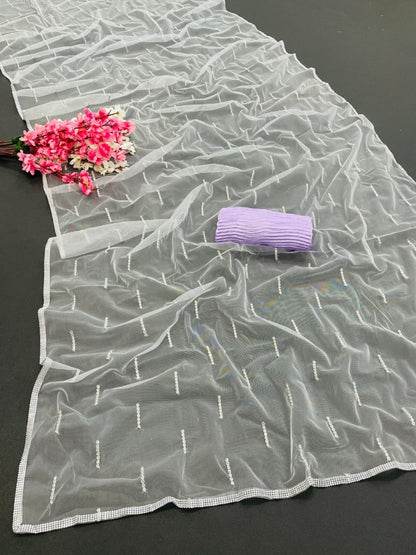 Light purple mono net thread sequence embroidered saree