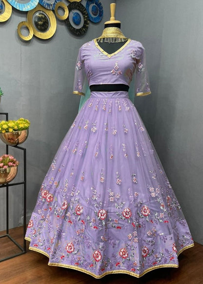 Light purple net heavy embroidered wedding lehenga choli