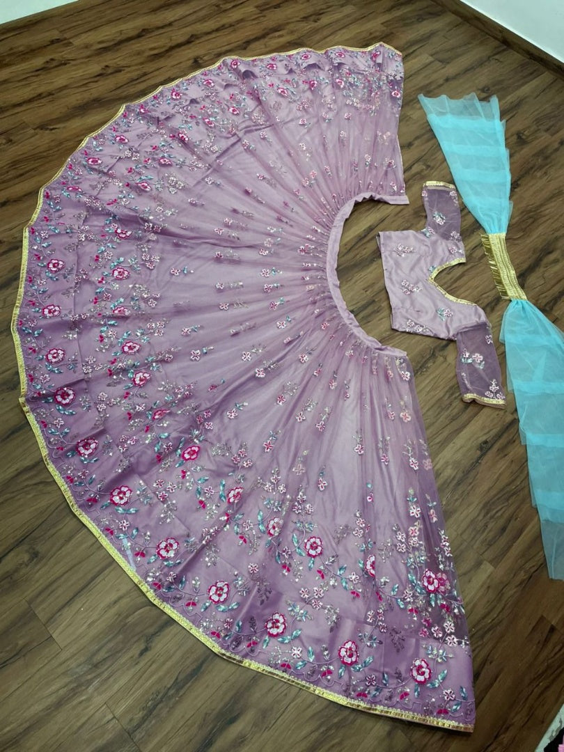 Light purple net heavy embroidered wedding lehenga choli