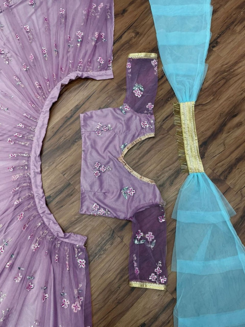 Light purple net heavy embroidered wedding lehenga choli
