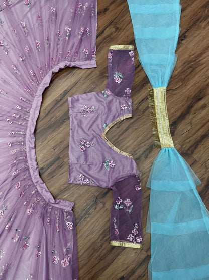 Light purple net heavy embroidered wedding lehenga choli