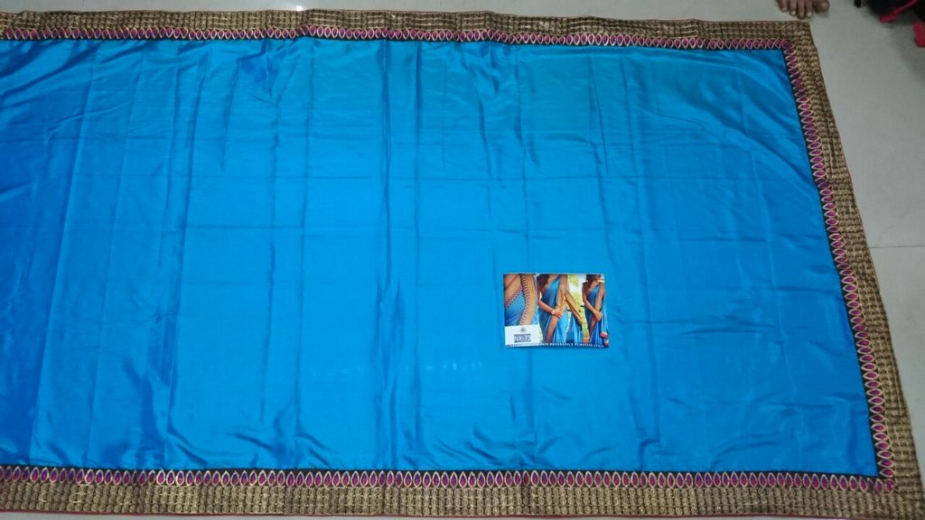mahaveer blue ceremonial embroidered saree