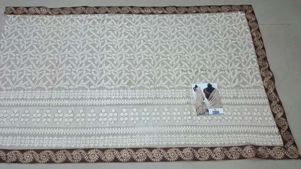 Mahaveer designer embroidered cream wedding saree