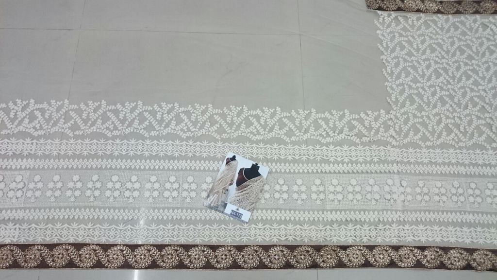 Mahaveer designer embroidered cream wedding saree