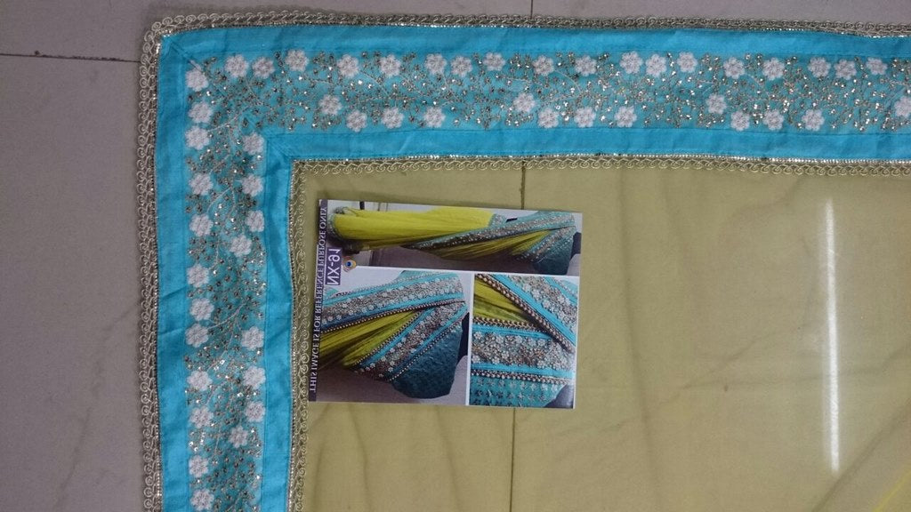 Mahaveer Designer embroidered green saree