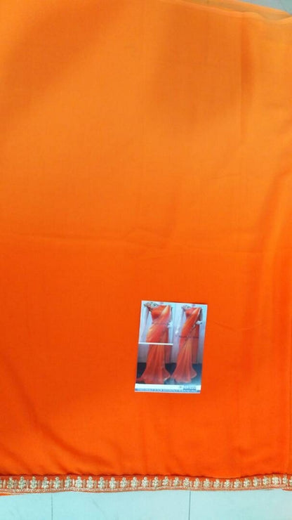 Mahaveer designer partywear orange saree