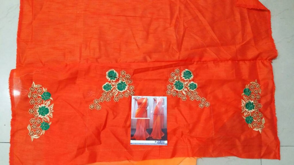 Mahaveer designer partywear orange saree