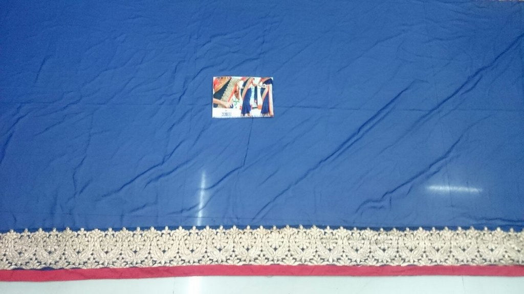 Mahaveer embroidered blue saree with heavy lace