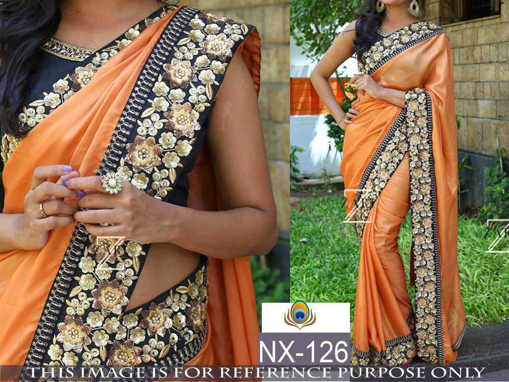 Mahaveer Gorgeous embroidered orange wedding saree