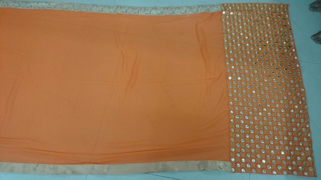 mahaveer orange ceremonial embroidered saree