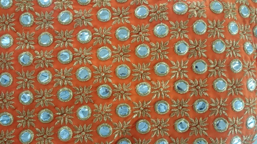 mahaveer orange ceremonial embroidered saree