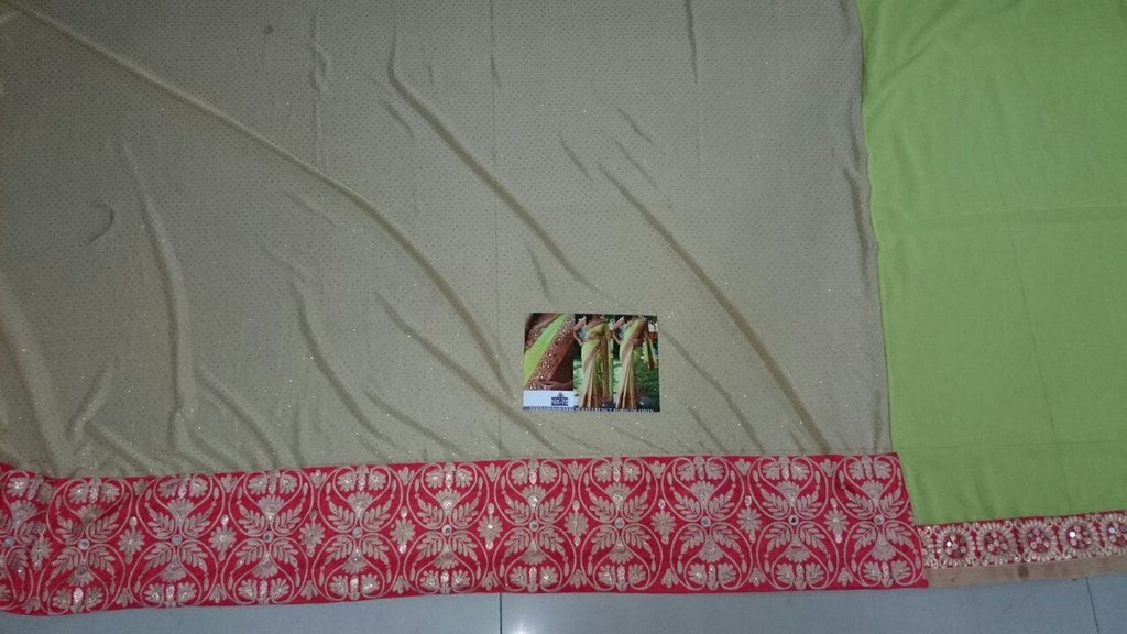 mahaveer parrot green ceremonial embroidered saree