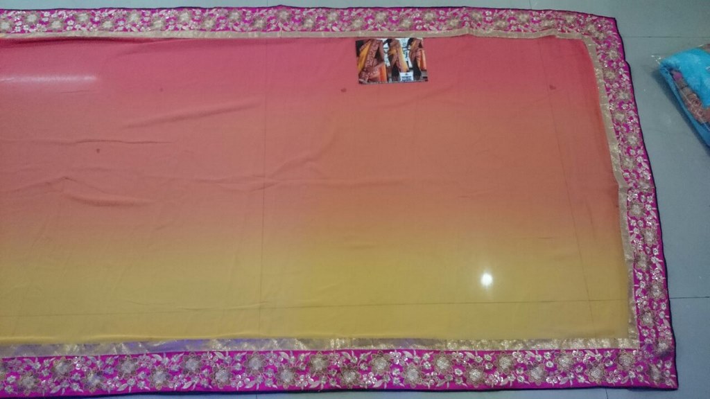 mahaveer yellow and black ceremonial embroidered saree