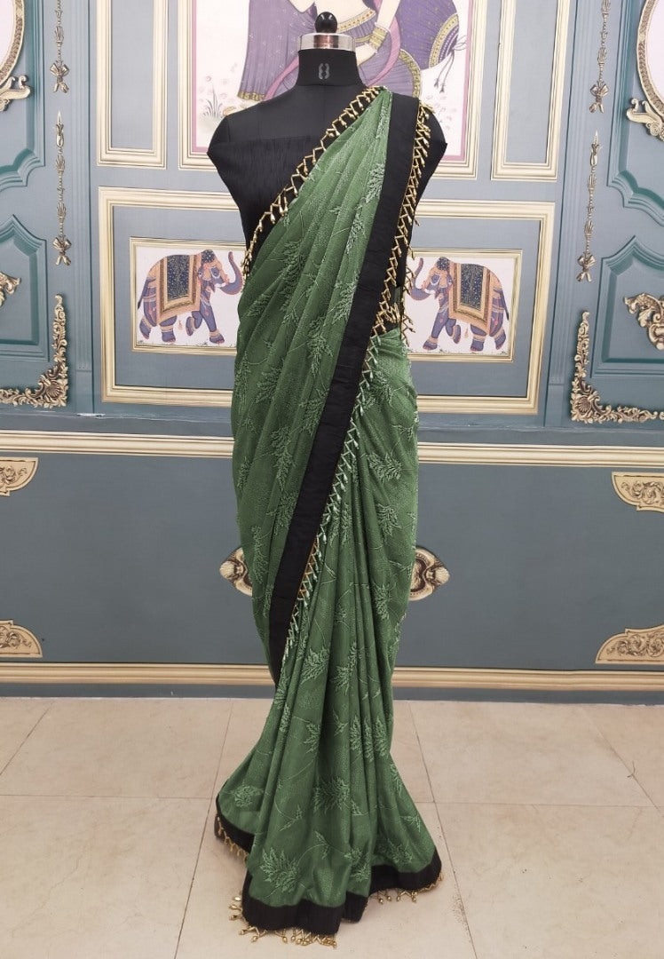 Mahendi green jursy jacquard saree with handwork border