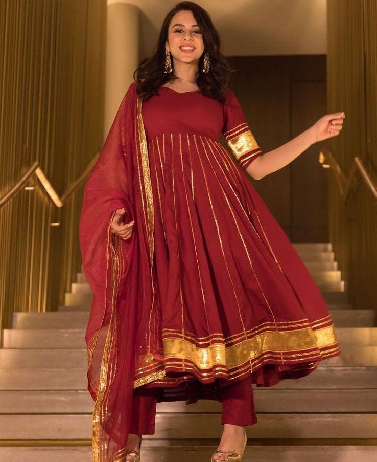 Maroon chanderi embroidered and line work salwar suit