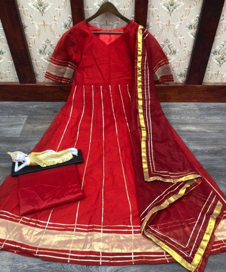 Maroon chanderi embroidered and line work salwar suit