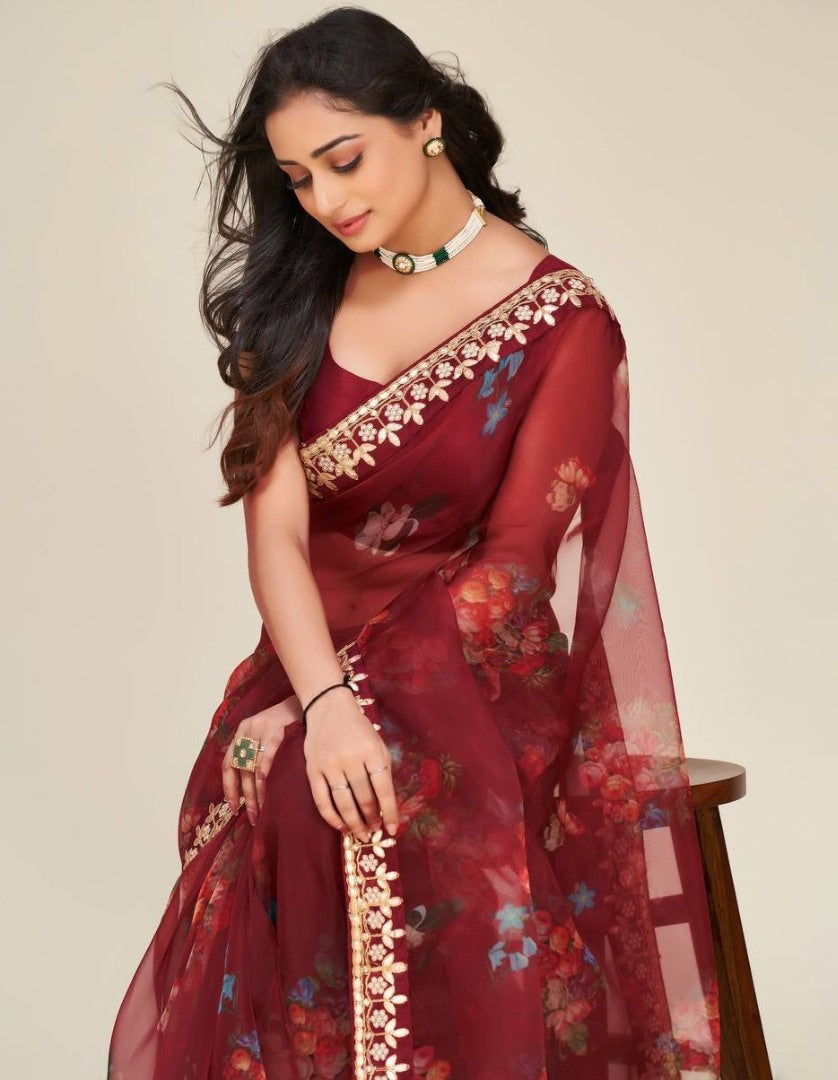 Maroon floral printed dori work organza saree