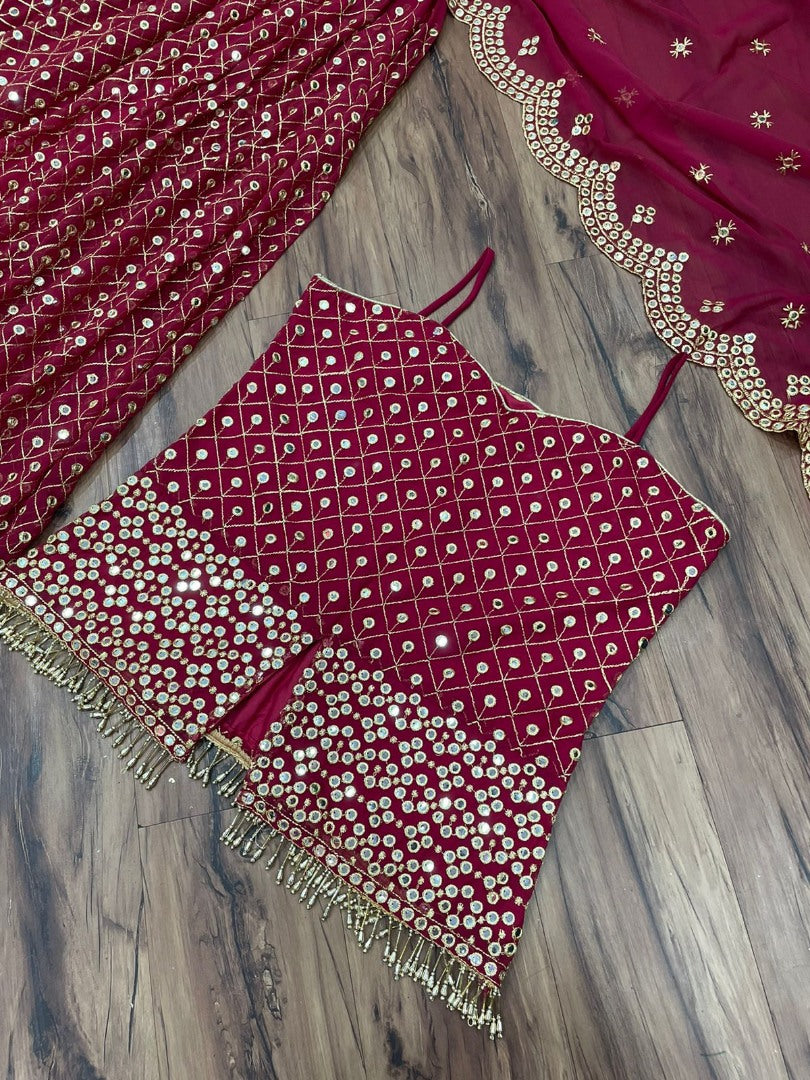 Maroon georgette heavy sequence work plazzo suit