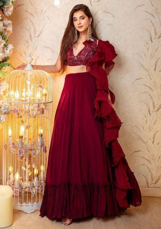 Maroon georgette ruffle flair lehenga with embroidered choli