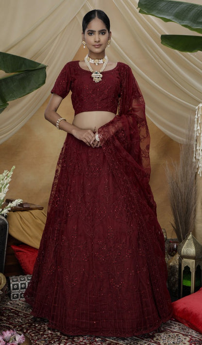 Maroon net heavy embroidered s wedding lehenga choli with koti