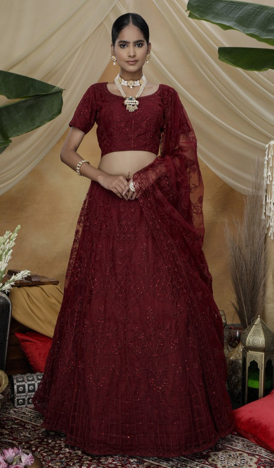 Maroon net heavy embroidered s wedding lehenga choli with koti